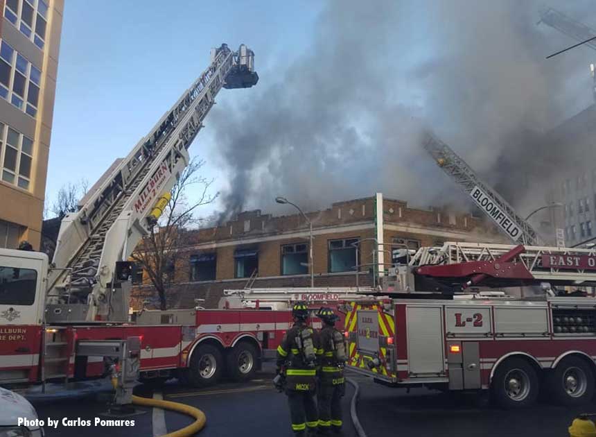 Photos: Bloomfield (NJ) Four-Alarm Fire An array of apparatus at a fire in a building housing several business in Bloomfield, New Jersey.